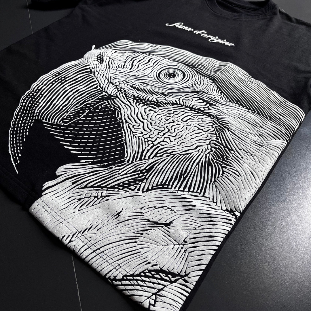 The Macaw Tee